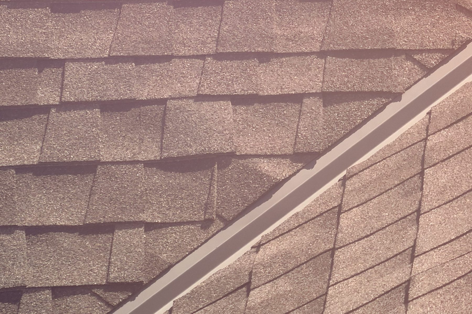 Fort Worth — new architectural shingles at roof valley after inspection