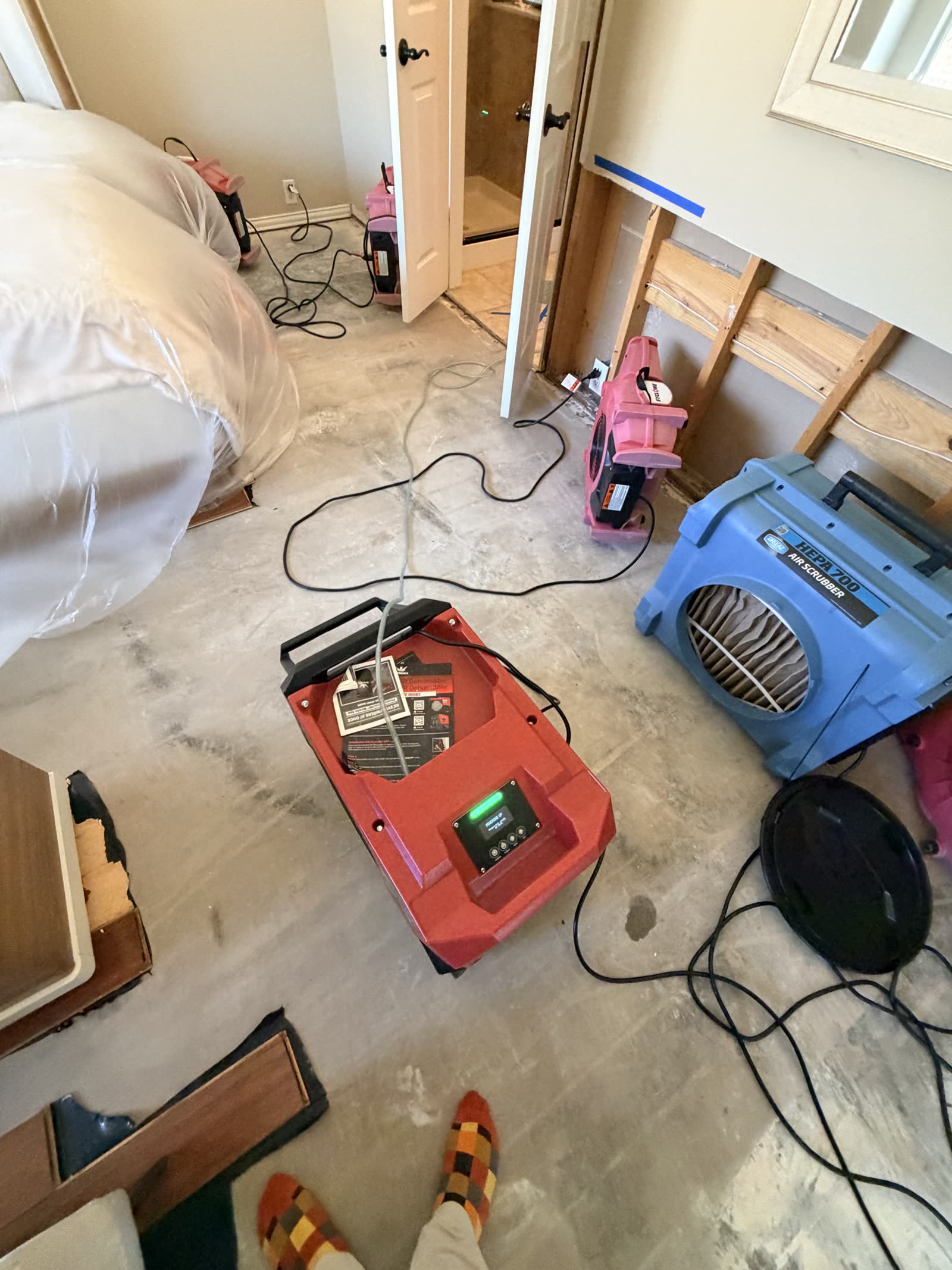 Fort Worth — opened wall cavity, HEPA, and dehumidifier