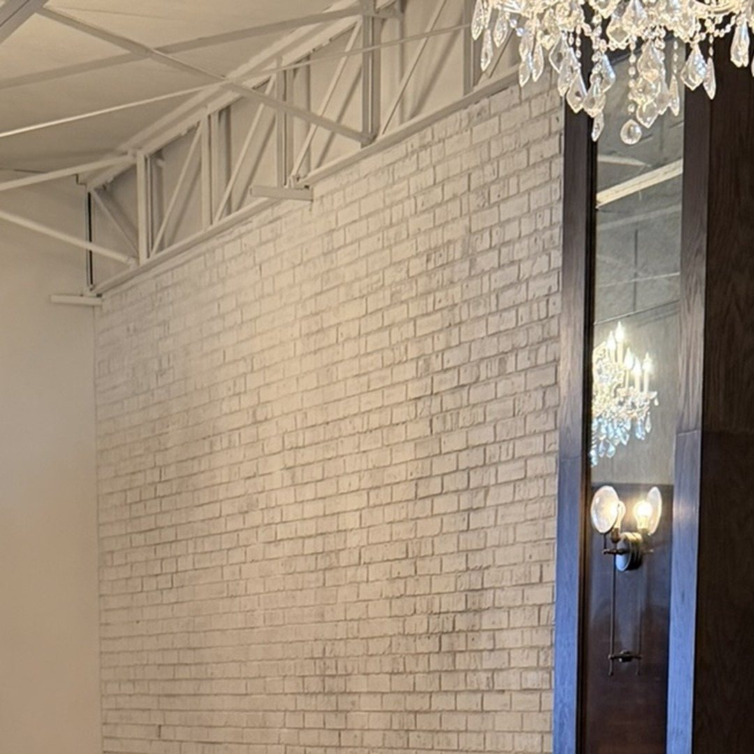 Dallas Design District — chandelier suite during the hardwood rebuild