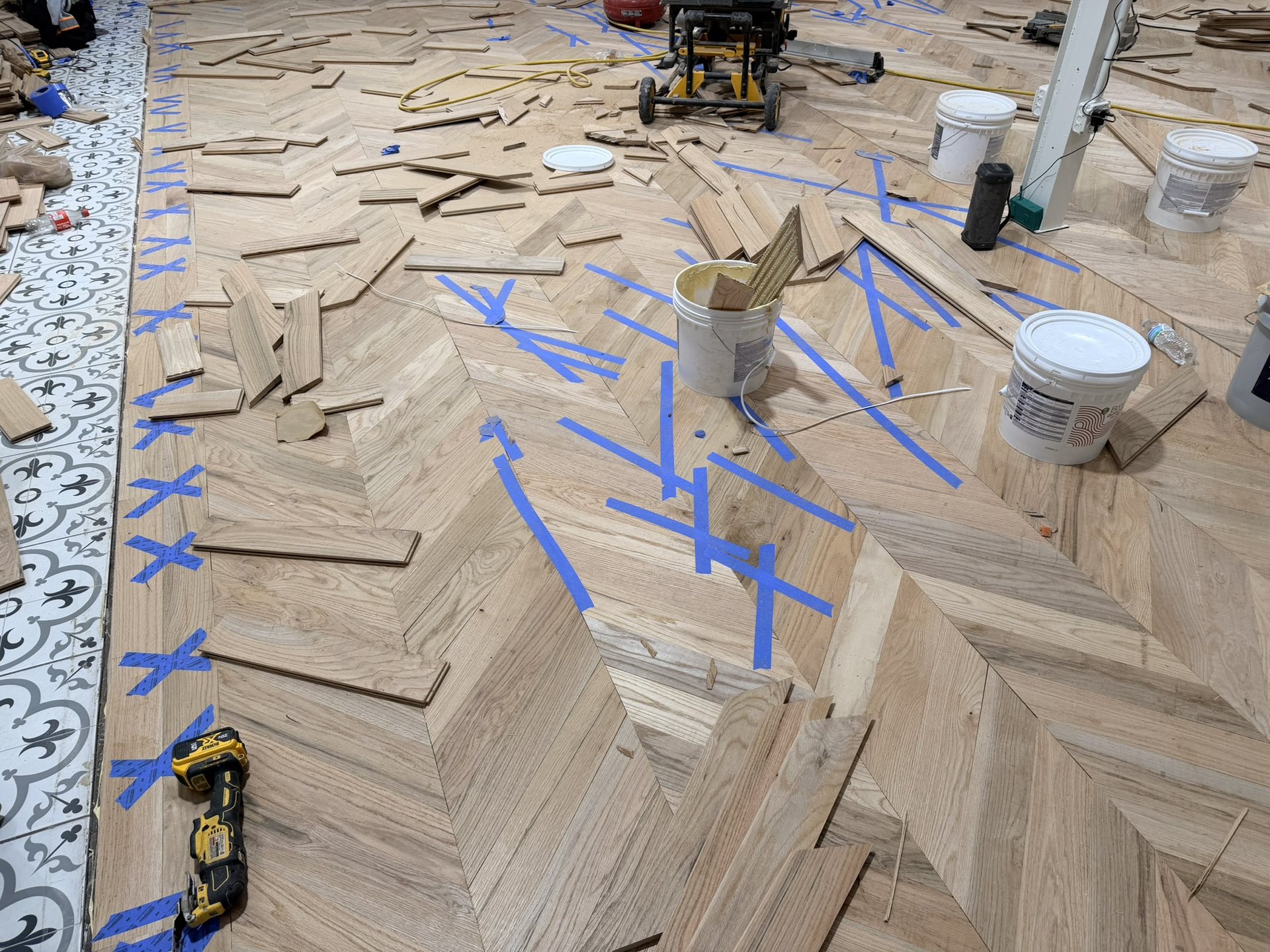 Dallas Design District — chevron hardwood going down