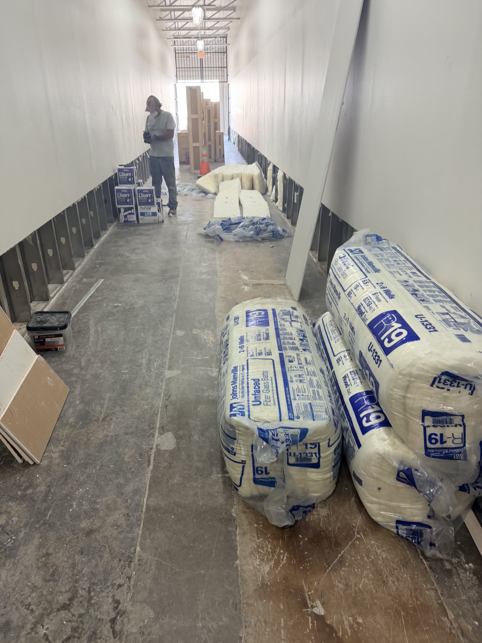 Fort Worth — new insulation going back into the corridor base
