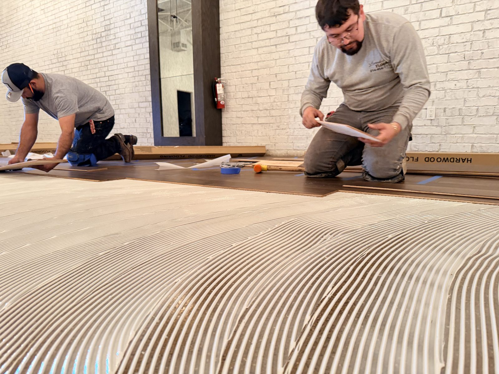 Dallas Design District — crew on the install line