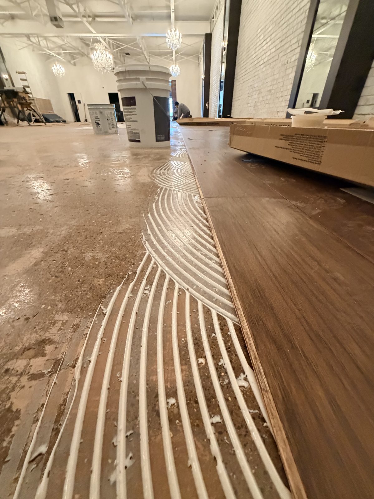 Dallas Design District — planks meeting adhesive