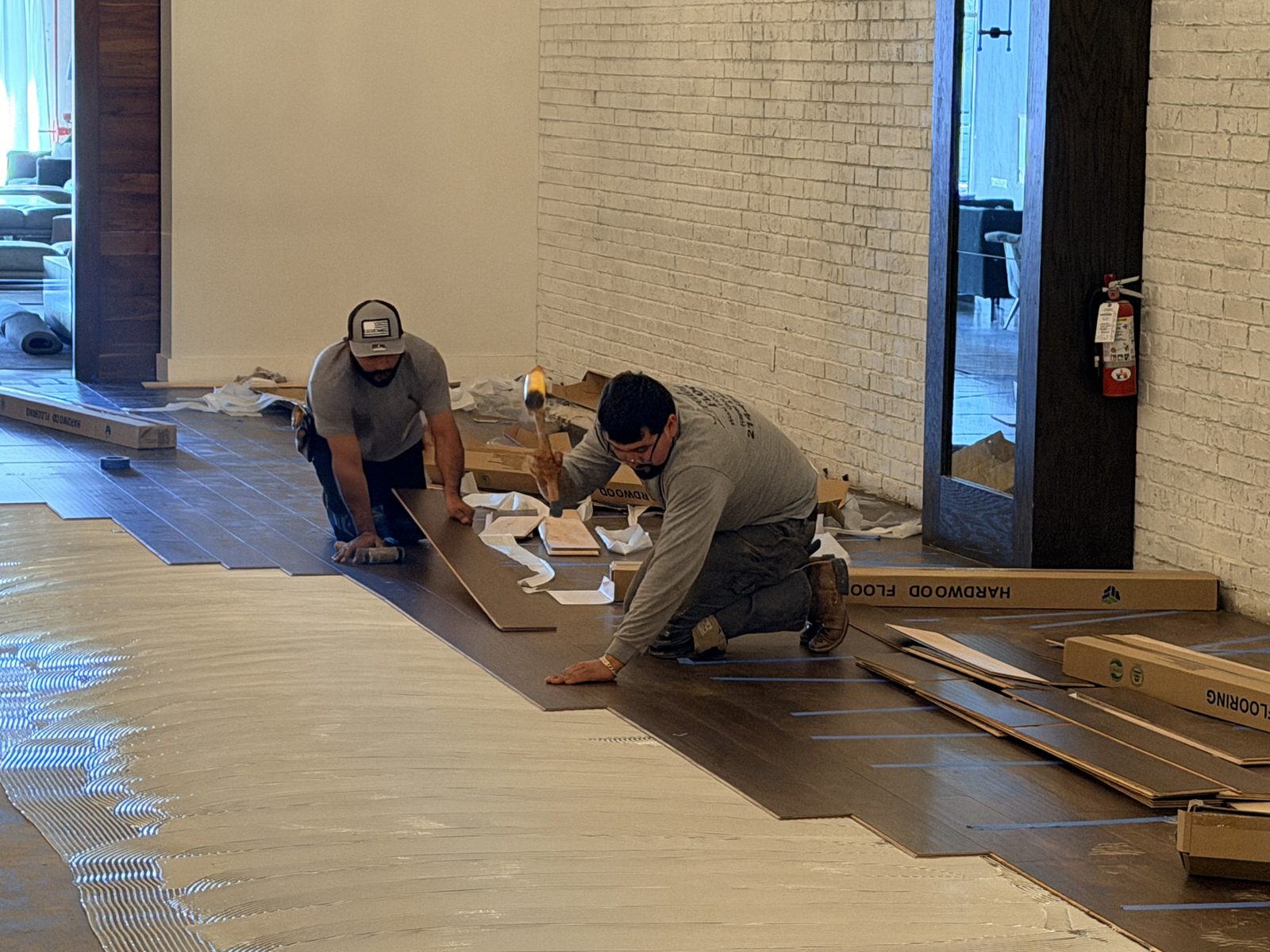 Dallas Design District — hardwood install in an adjacent suite