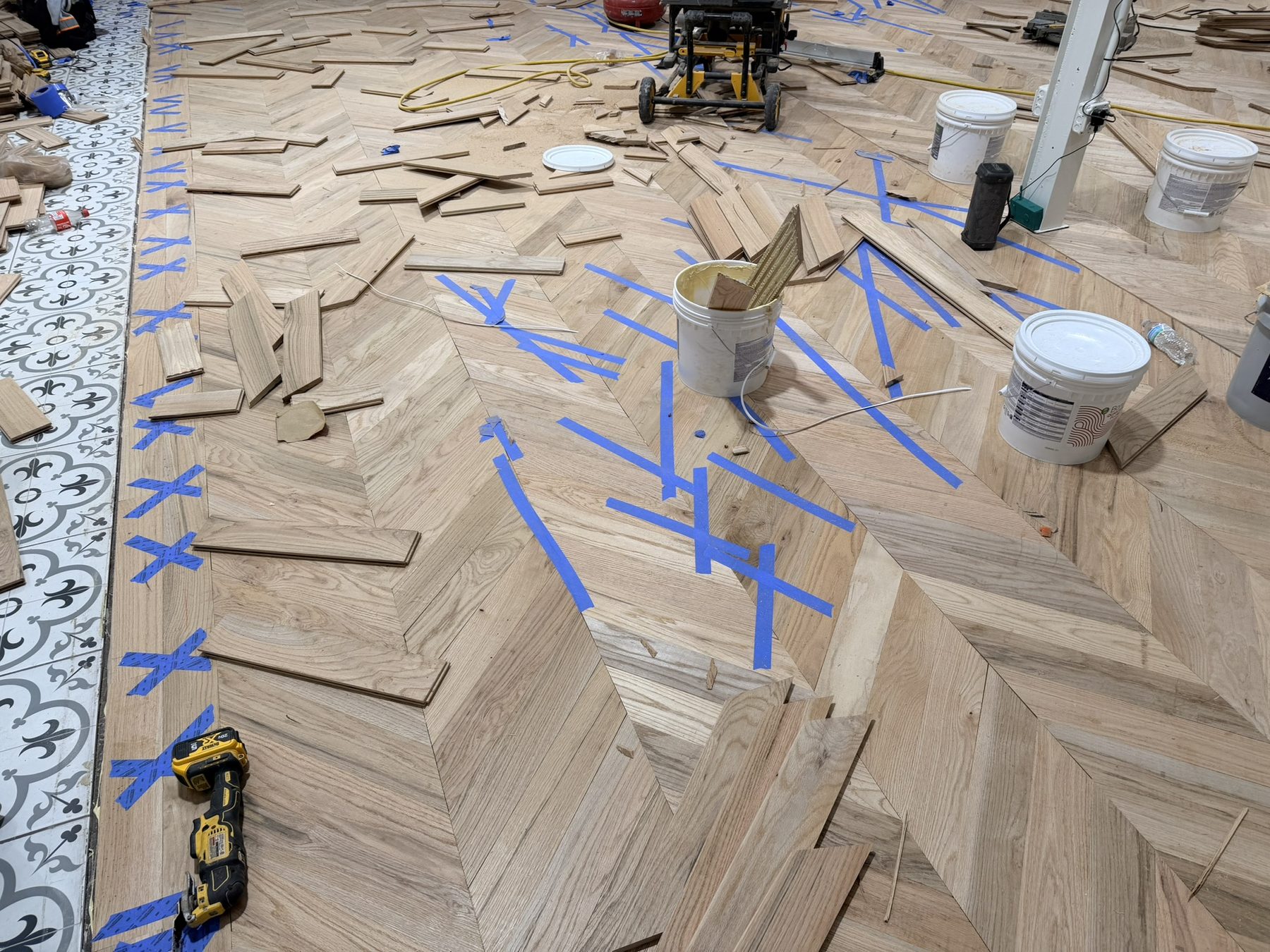 Dallas Design District — chevron hardwood going down