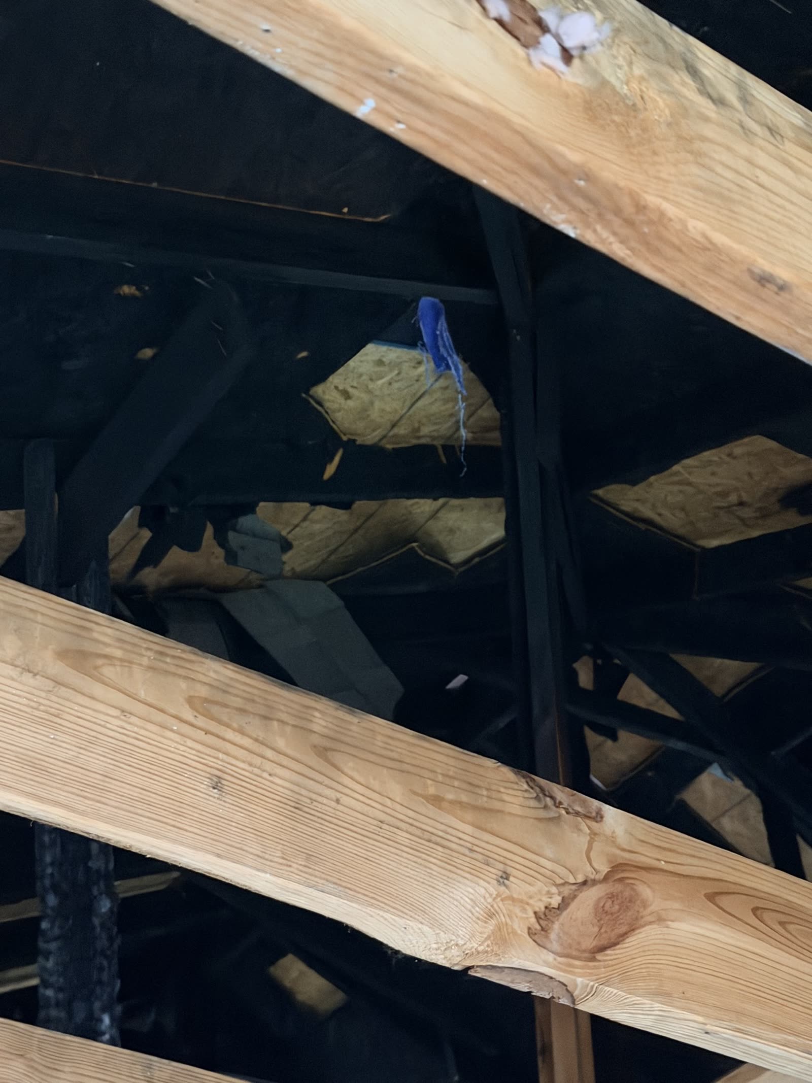 Fort Worth — melted plastic in a fire-damaged attic