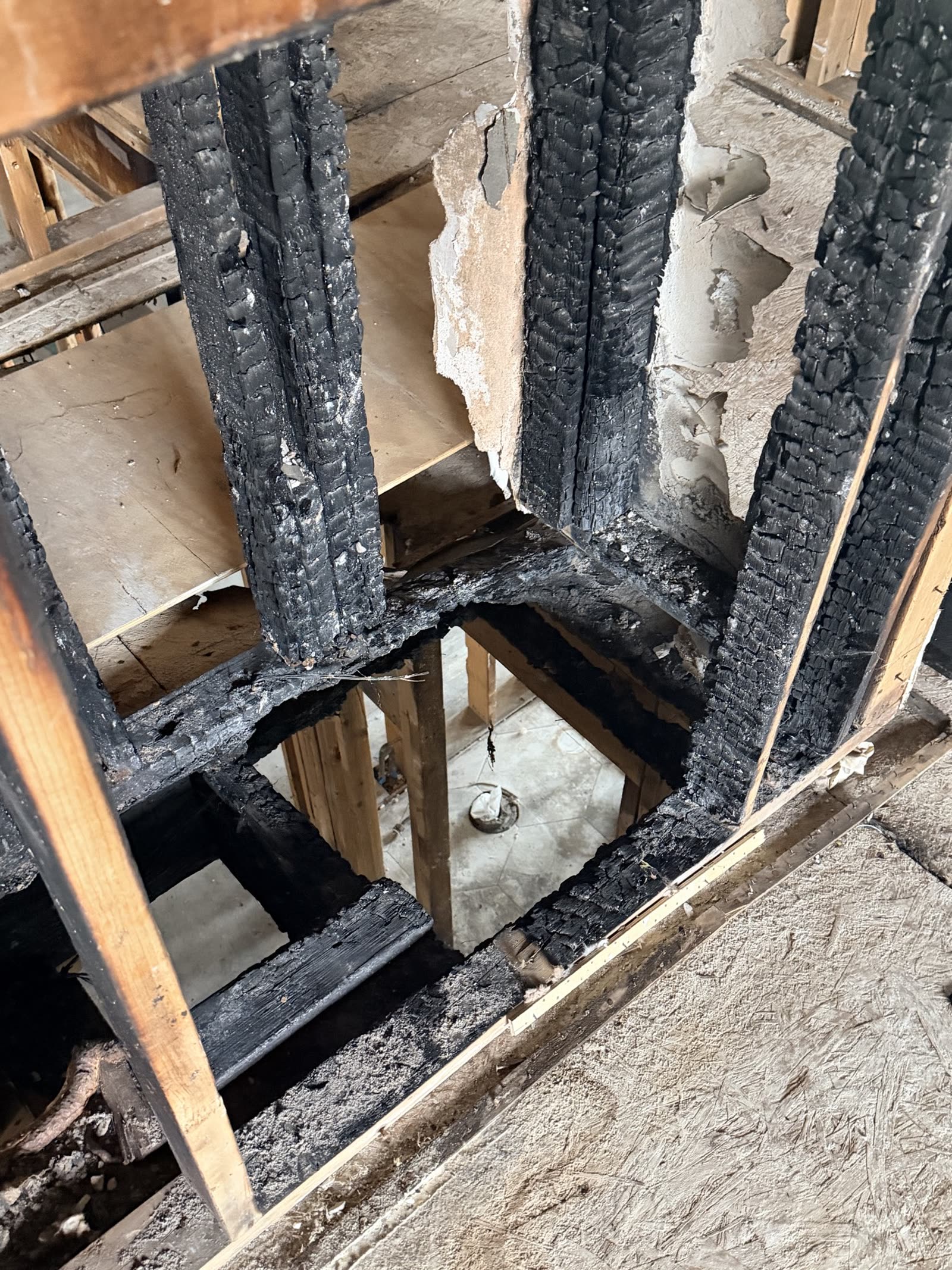 Fort Worth — looking down through charred joists