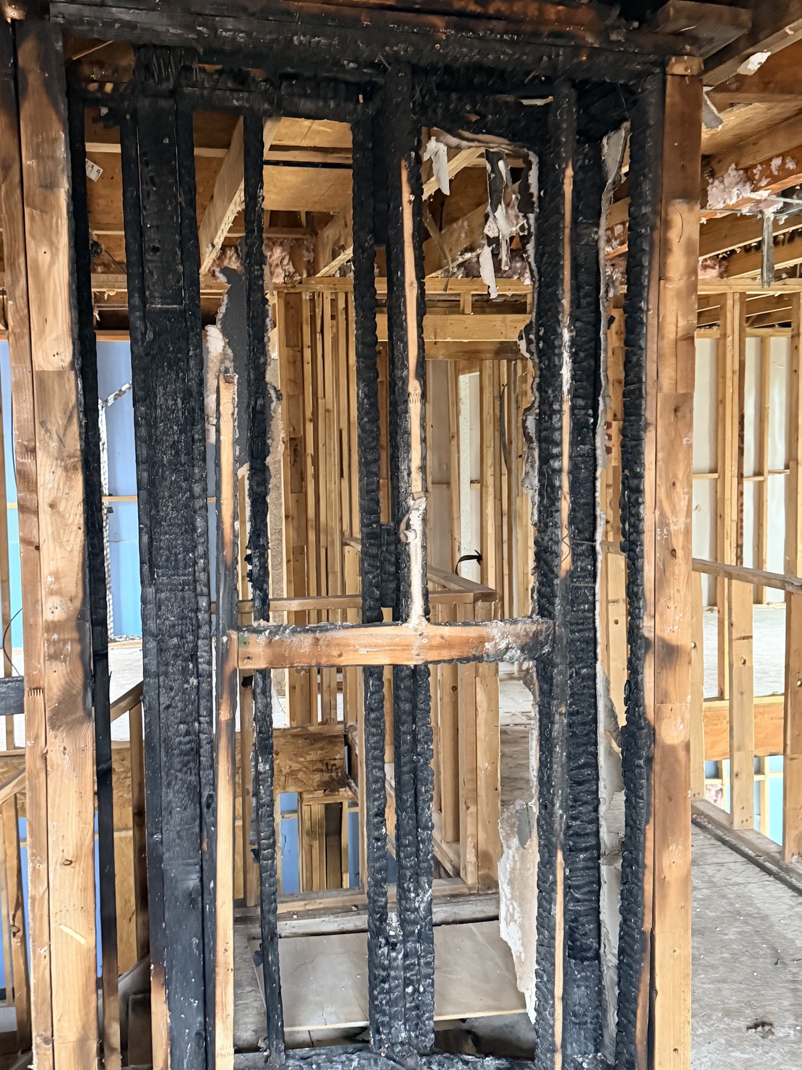 Fort Worth — charred studs after a house fire