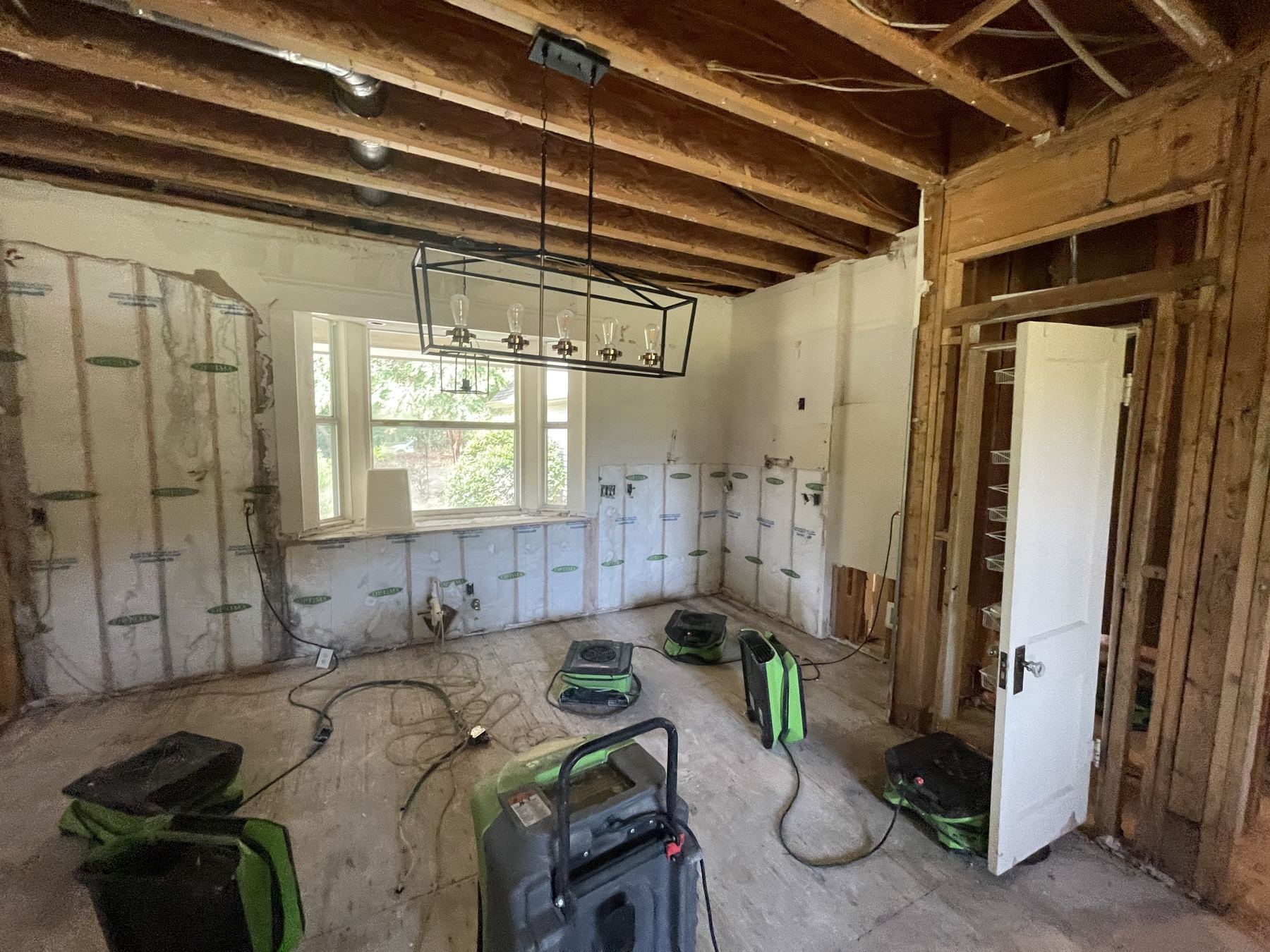 Fort Worth — flood-cut drywall during structural drying