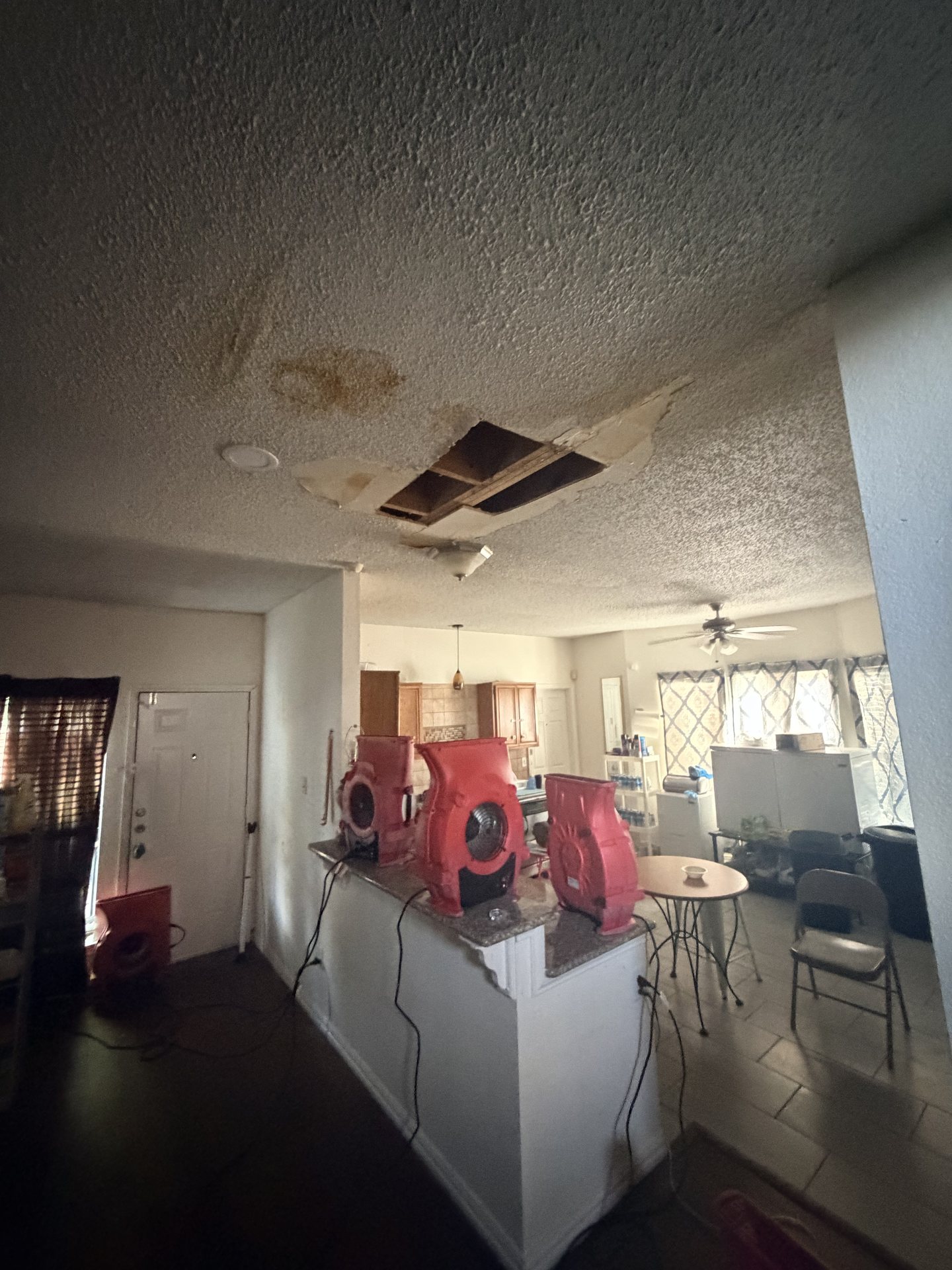 Fort Worth — opened ceiling and air movers during water mitigation