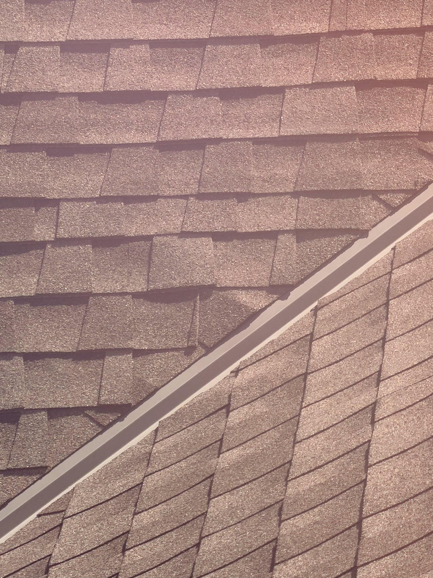 Fort Worth — architectural shingles at a roof valley