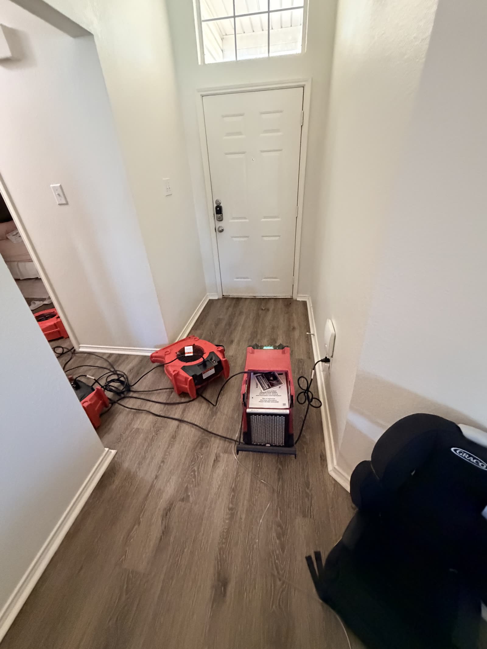 Fort Worth — dehumidifier and air movers in the hall
