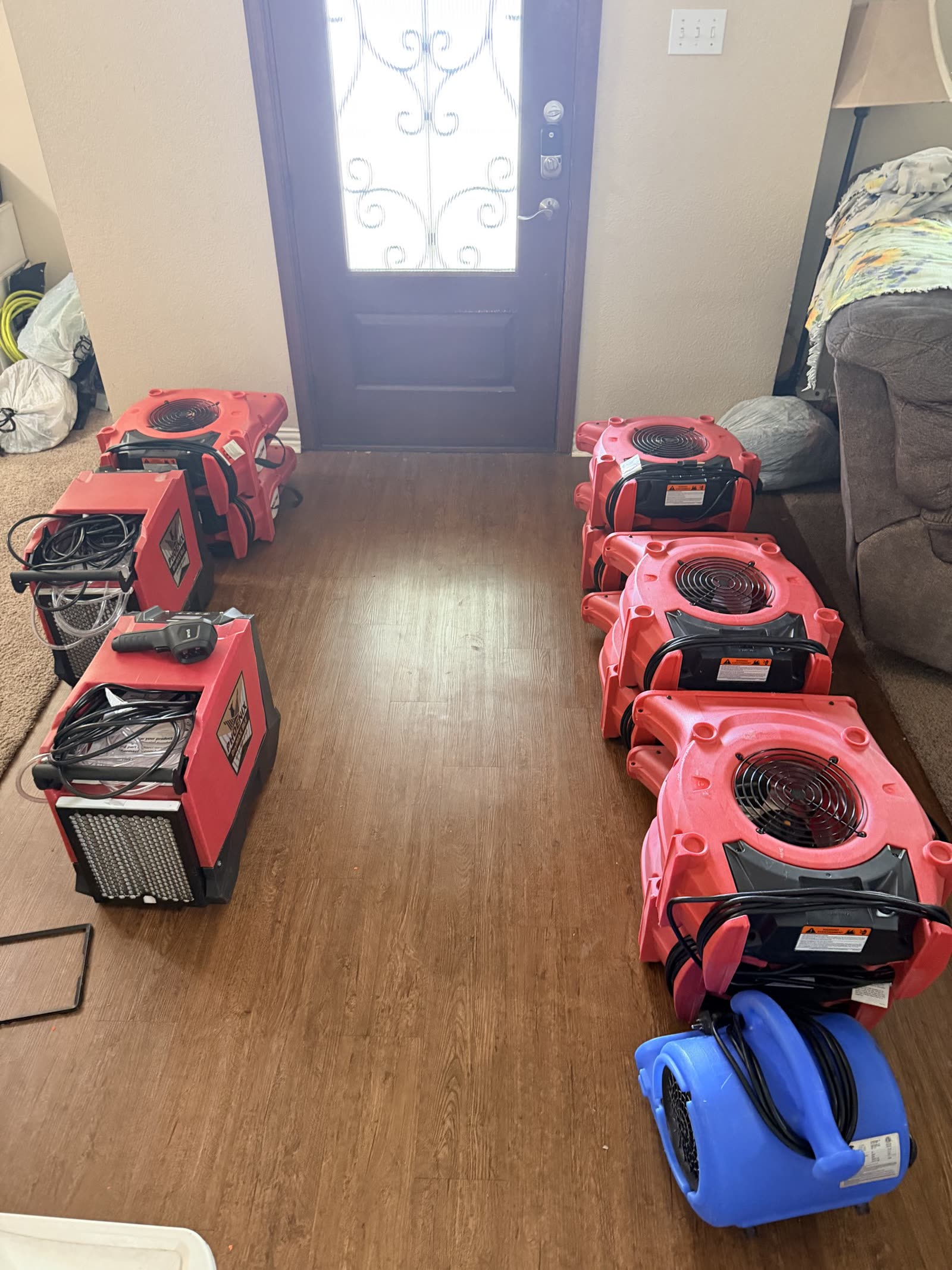 Fort Worth — air movers and dehumidifiers at the front door