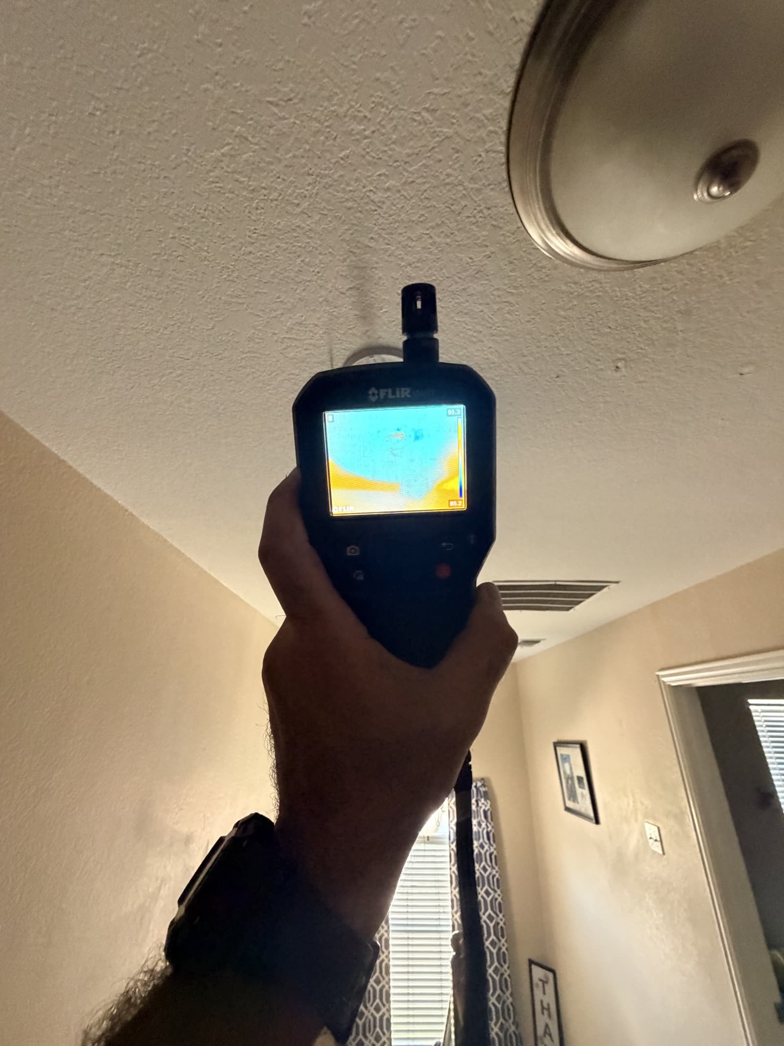 Fort Worth — thermal camera aimed at a ceiling during a water loss