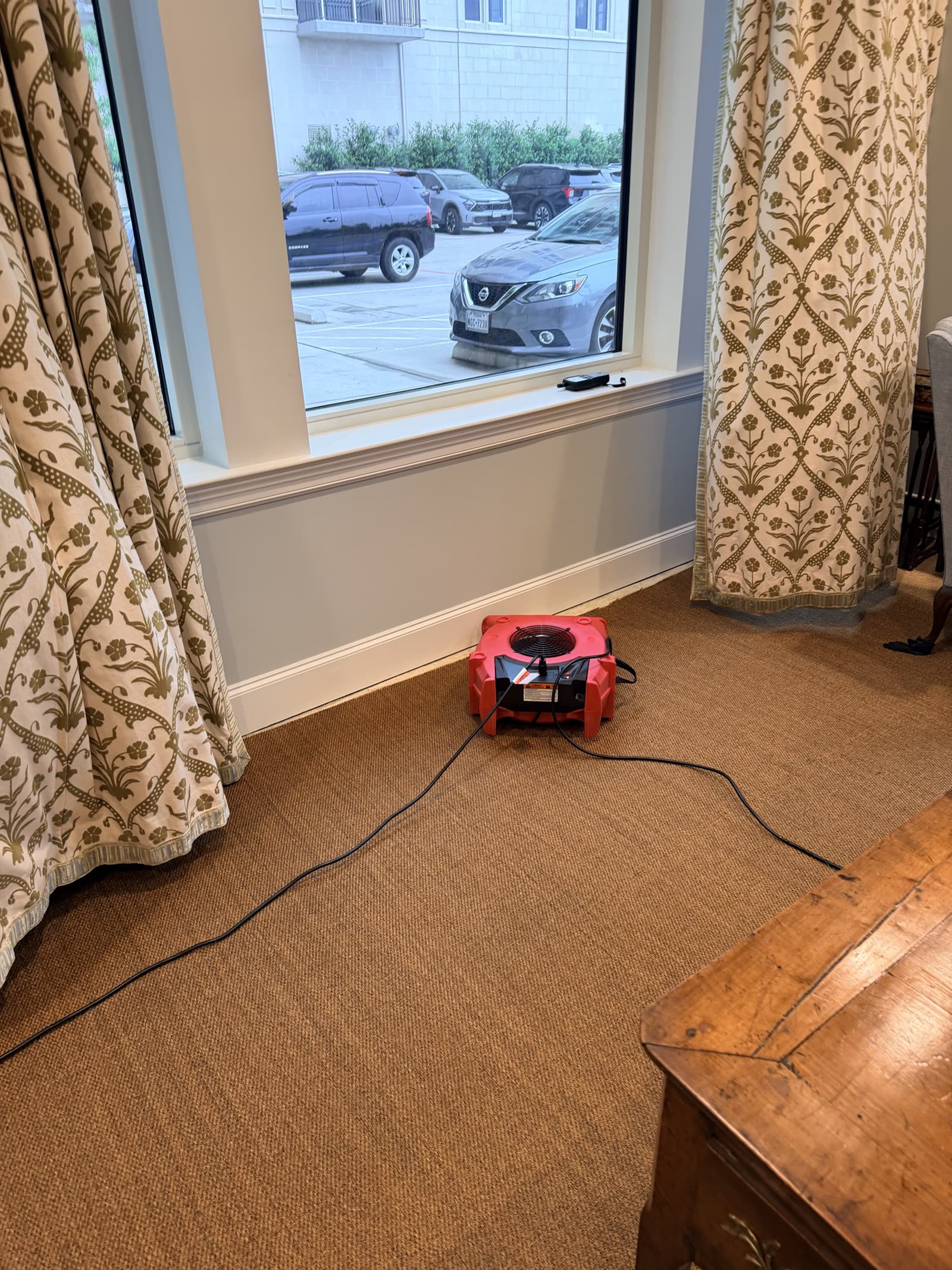 Fort Worth — air mover at the window on the wet carpet path